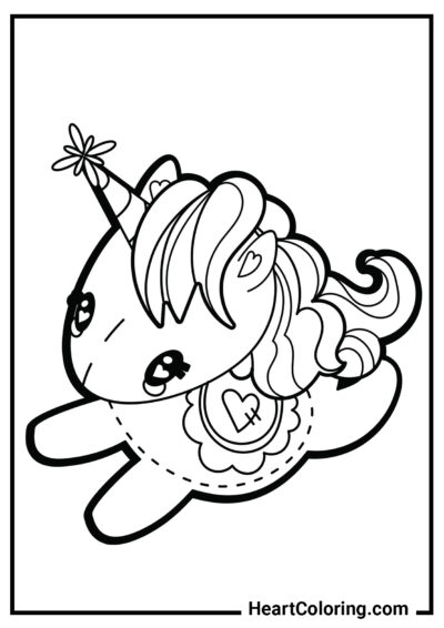 Adorable licorne en peluche avec un cœur - Coloriages Licorne