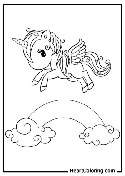 Unicorno carino che vola sopra l’arcobaleno - Disegni di Unicorni da Colorare