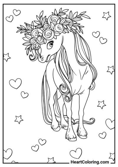 Jolie licorne avec une couronne de fleurs — coloriage gratuit tiré de "Coloriages Licorne"