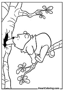 Winnie Exploring a Tree Hollow – fun and simple printable page