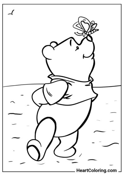 Winnie the Pooh and the butterfly - Winnie the Pooh Coloring Pages