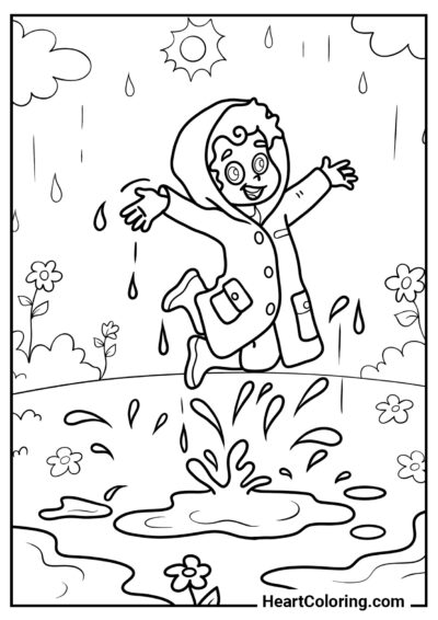 Happy boy jumping in puddles - Spring Coloring Pages