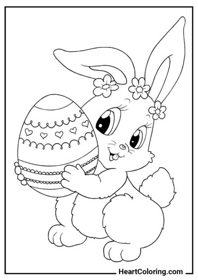 Coniglietto con uovo di Pasqua - Disegni di Conigli da Colorare