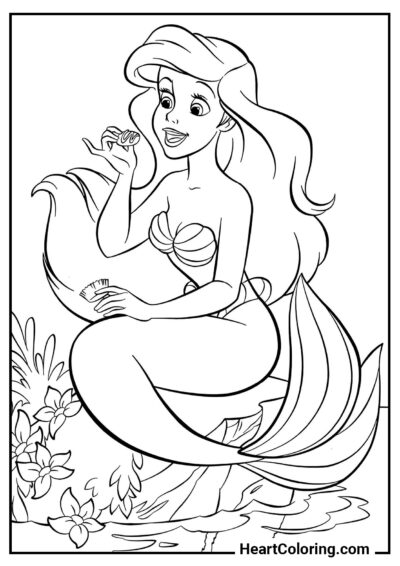 Ariel avec des biscuits - Coloriages de La Petite Sirène